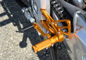 Aprilia Tuono V4 REAR SETS - Stock Shift Pattern (includes Exhaust Hanger) Fussrastenanlage Sato Racing